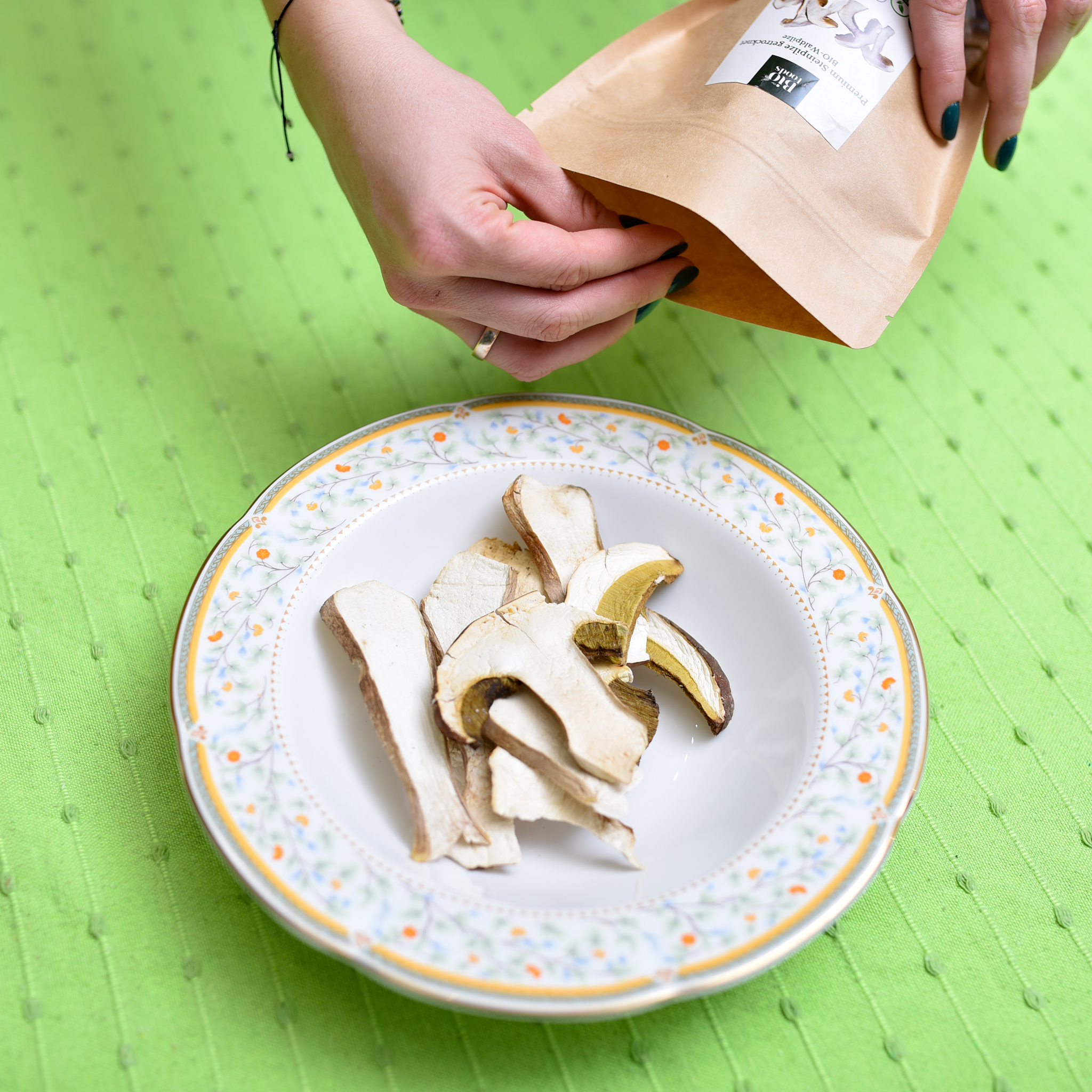 Organic Premium Dried Porcini from the package on the plate.